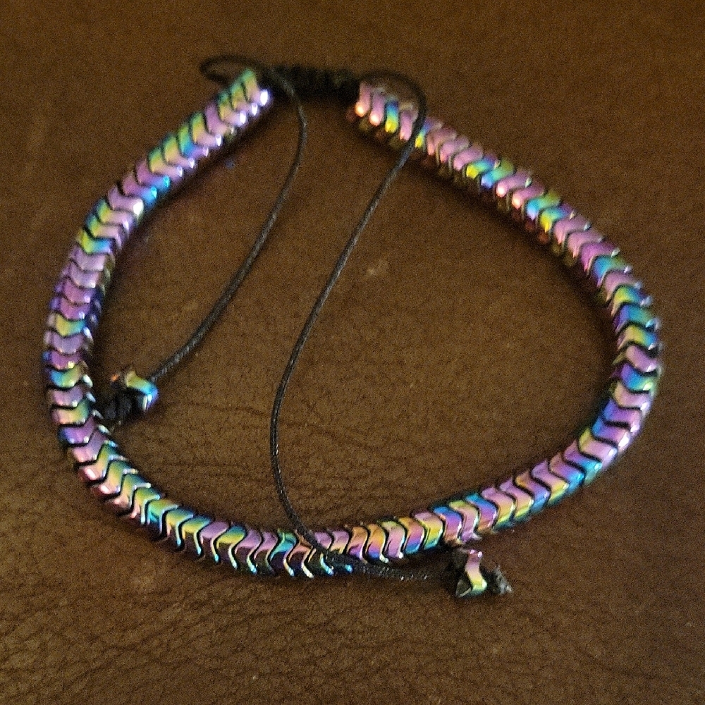 The Hand Crafted Rainbow Hematite Bracelet Adjustable Black Cord
